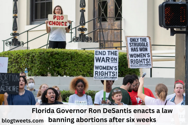 Florida Governor Ron DeSantis enacts a law banning abortions after six weeks